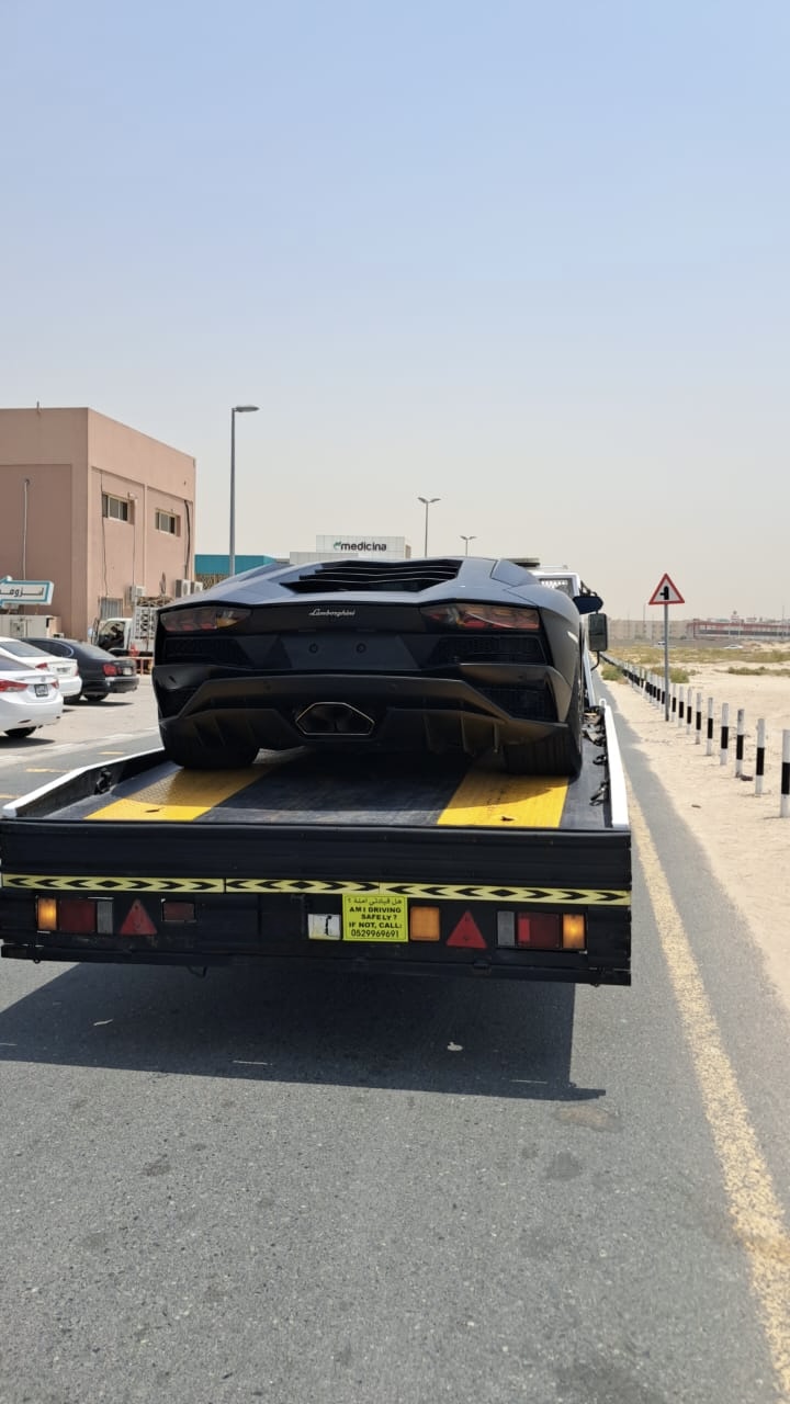 Lamborghini Aventador transported on a flatbed in Dubai